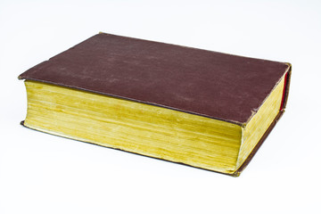 Big brown book isolated on a white background.