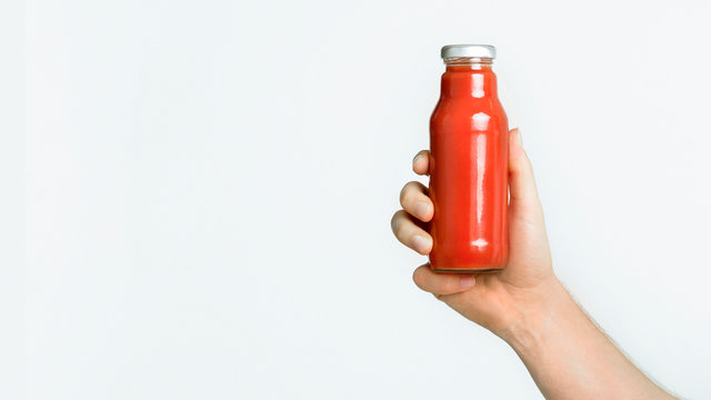 Woman Hand Holding Detox Bottle On White Background