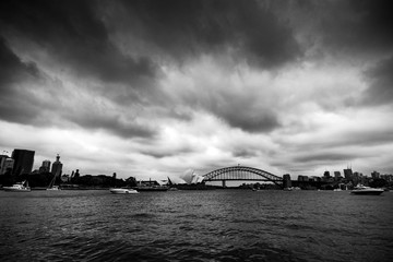 Moody skies over Sydney harbour as dusk falls