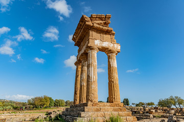 Fototapeta na wymiar Temple of Dioscuri (Castor and Pollux). Famous ancient ruins in Valley of Temples, Agrigento, Sicily, Italy.