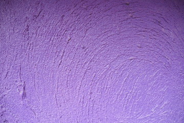 Cement wall painted in dark purple tone with rough surface and texture for background and decoration. Cool banner on page and cover