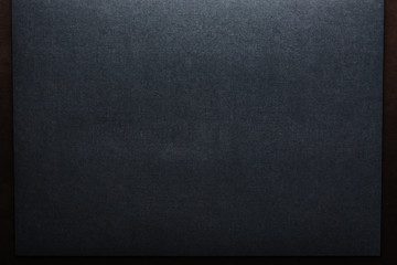 Fototapeta premium The texture of a black blank page tablet for pastels. Black background of paper texture.