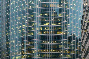Fototapeta na wymiar Windows of skyscraper business office. Moscow, Russia