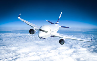 Fototapeta na wymiar Passenger plane close up flying on cruising altitude - above clouds