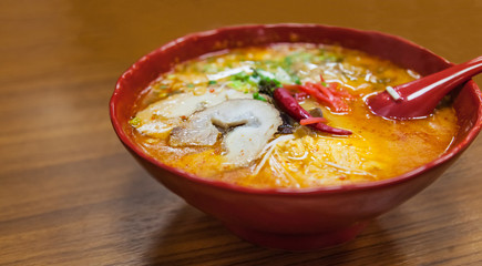 Traditional Japanese Food, Spicy Ramen Noodle in Miso Broth Soup with Chashu Braised Pork Belly Topping. Oriental Cuisine, Gourmet, Culinary, Delicacy, Cooking, Fast Food Nutrition and Culture concept