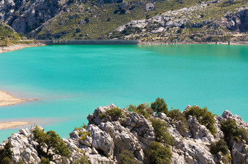 Obraz premium Gorg Blau, an artificial lake located at the valleys of the mountainous part of Mallorca, Spain