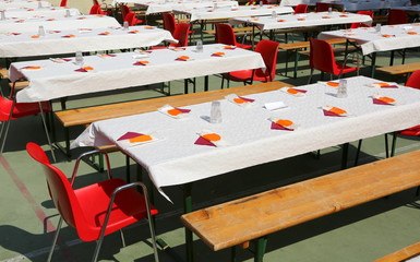 tables set for a lunch with many guests