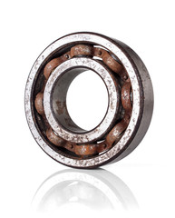 Rusty ball bearing isolated on white background
