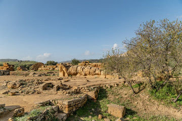 Giant Telamon, Atlas supporting statue of ruined Temple of Zeus in the Valley of Temples of Agrigento, Sicily, Italy.