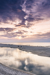 Late summer sunset on the Baltic sea coastline. Landscape of a beach near Ustka, Poland.