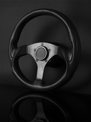 Steering wheel isolated on black