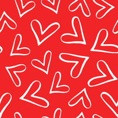 Seamless pattern with red hearts