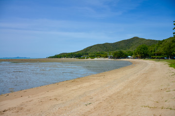 Low tide at noon, sunny at the Thai sea, north of Pattaya.