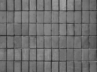 Tiled wall in black and white, background