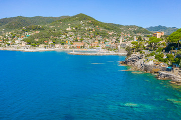 Fototapeta na wymiar Rocky bay in Camogli, Italy. Aerial view on Adriatic seaside, liguria.