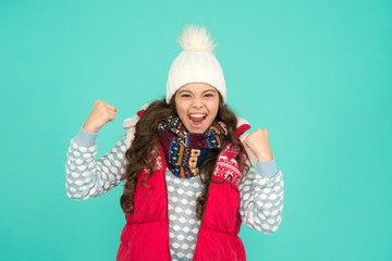 finally vacation time. Stay active this season. kid wear knitted warm clothes. just have fun. winter vibes. Portrait of happy girl hipster. Youth street fashion. Winter fun. feeling good any weather