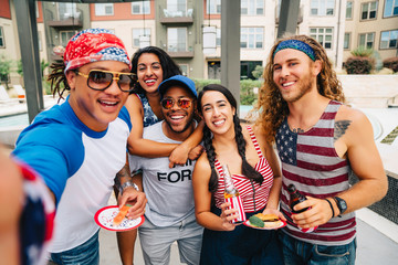 Air Force Veteran and friends having a 4th of July BBQ party at apartment complex. 