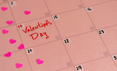 The inscription Happy Valentine's Day on the pink calendar