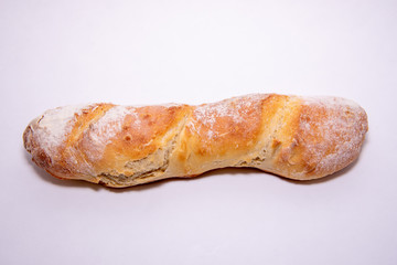 Baguette on a white background