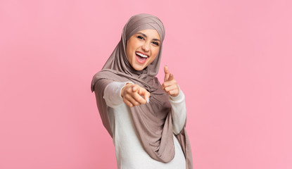 Positive Arabic Woman Pointing Fingers At Camera Posing On Pink Background
