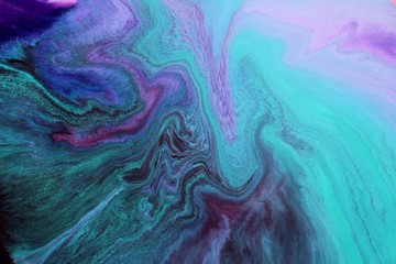 Abstract black-purple-green background. Game of colors. Acrylic texture with marble pattern....
