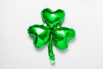 Air balloon green clover on a white background. St. Patrick's Day concept, clover for good luck,...