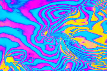 Abstract trendy neon colored psychedelic fluorescent striped zebra textured neon background