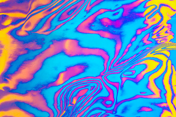 Abstract trendy neon colored psychedelic fluorescent striped zebra textured neon background