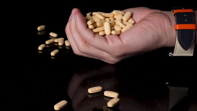 Medication, Prescription Pills Being Emptied into a Person's Hand, Close-up 