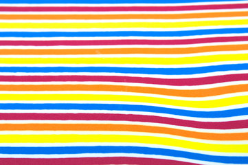 Background surface with multi-colored stripes