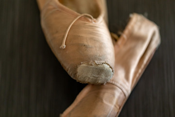 Old and used ballet slippers
