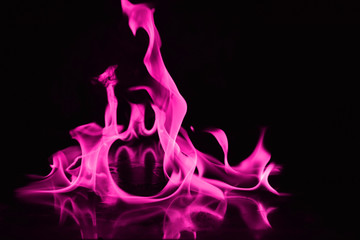 Beautiful fire pink flames on a black background.