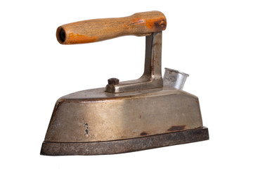 Old iron isolated. Close-up of a professional old large rusty electric tailor iron or flatiron with...