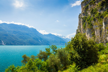 Fototapeta na wymiar Nature wilderness landscape with mountains at lake Garda, Italy