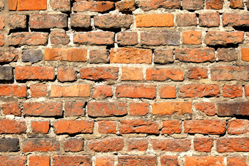 Orange bricks old vintage wall. Abstract architectural background for design.