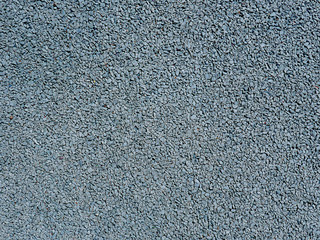 Rough surface in gray-blue, close-up, background