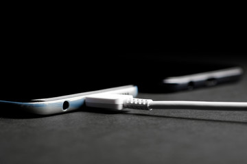 Close up Mobile phone Charger with USB Type-C (USB-C). USB type C cable charger and port of the...