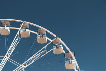 Ferris Wheel Over Blue Sky