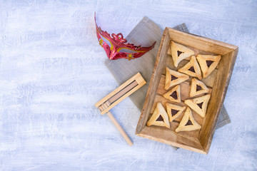 Jewish Hamantaschen homemade biscuits or cookies with chocolate. Top view or overhead composition with copy space