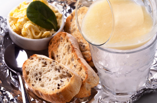 Pike caviar on dry ice with toast of toasted bread and butter, close- up image
