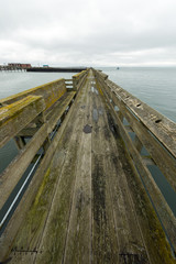 The Fishing Boardwalk Stretches into the Harbor in Westport, Washington, USA