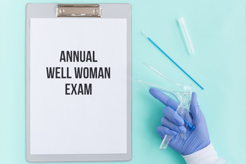 Flat lay: annual well woman exam, cervix cancer control. Gynecological speculum gyneas Cusco,...