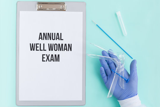 Flat lay: annual well woman exam, cervix cancer control. Gynecological speculum gyneas Cusco, cyto-cervical sampler brush-smear test, assay tube, folder for diagnosis, treatment, gloved hand of doctor