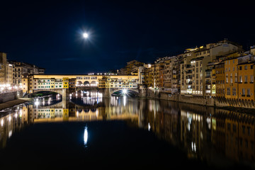 Fototapeta na wymiar Ponte Vecchio at Night under Moonlight