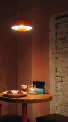 Interior of mexican cantina bar with dim lights and candles