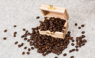 Good coffe beans in a treasure chest