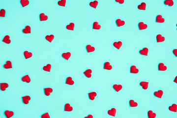 Valentine's Day background. Red hearts on pastel blue background. Valentines day concept. Flat lay, top view