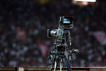 TV camera at the stadium during football matches