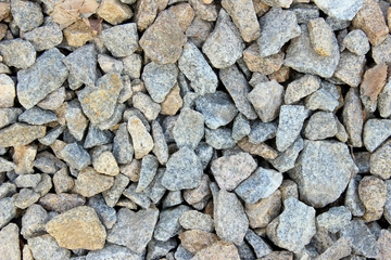 Scattered stones background. Cropped shot of stones texture. Abstract nature background.