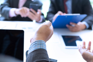 Businessman team is analyzing the cost of housing projects to live with lifestyle.business concept, soft focus, vintage tone